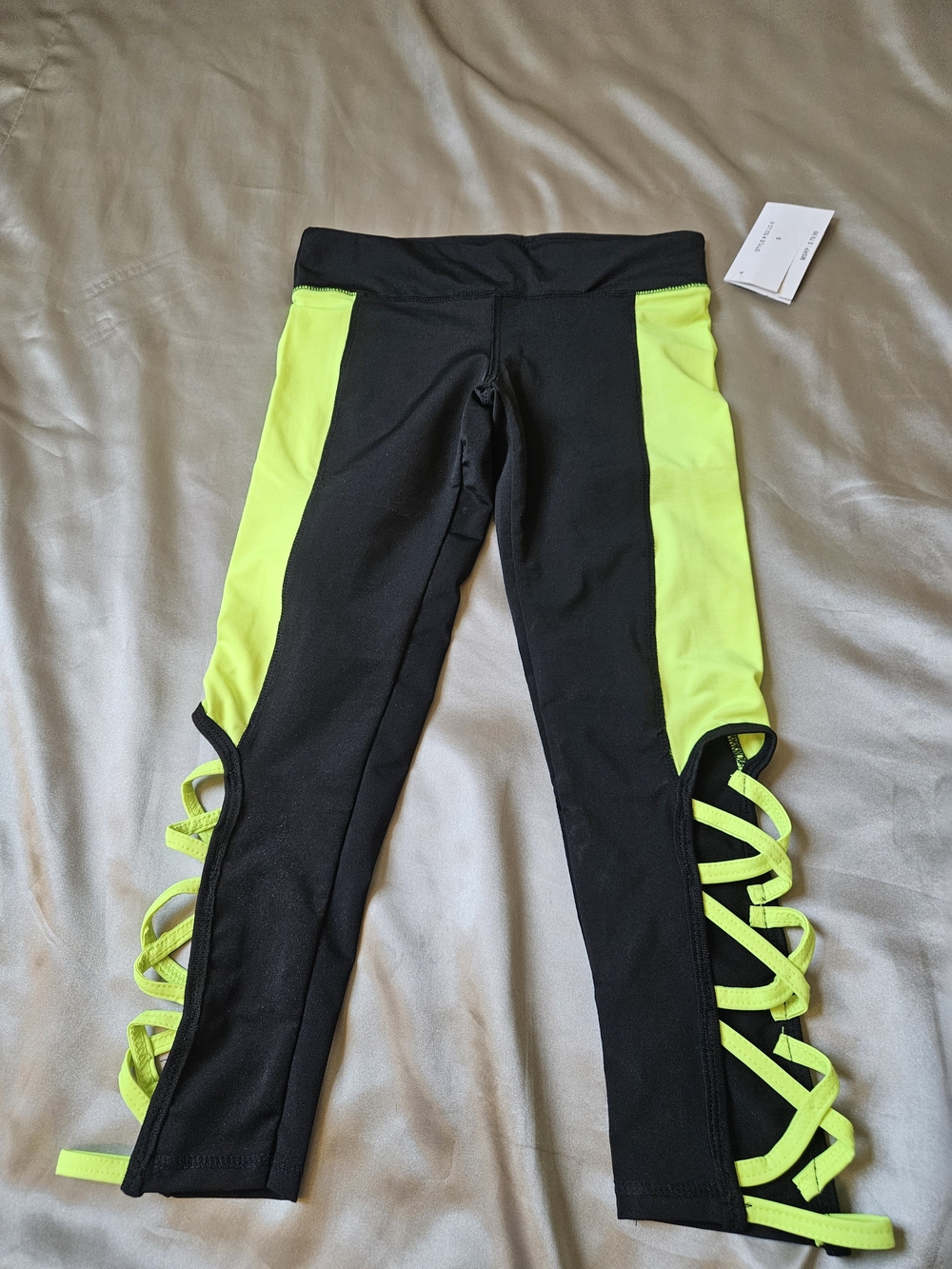 NWT*Women's Black Leggings with Neon Yellow Side Panels Lattice Straps Size S